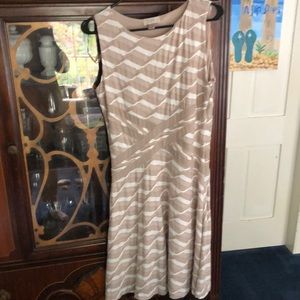LOFT, size 14, soft to touch, side zipper dress. Cream/light brown colors.